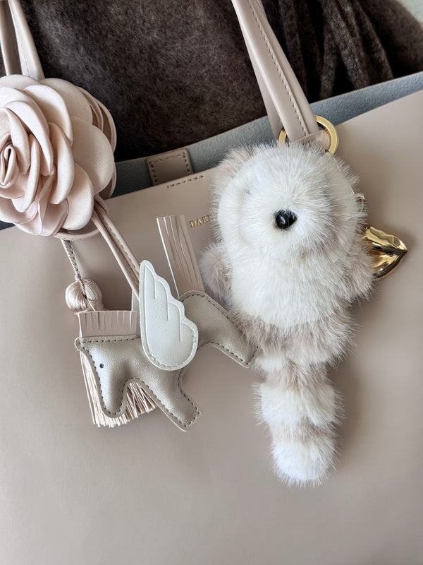 RACCOON BAG CHARM SAND W/OFF WHITE