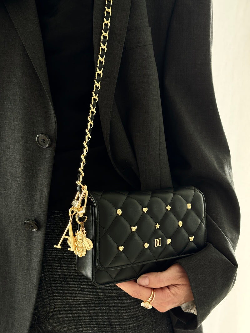 LEATHER QUILTED MINI BAG W/SIGN STUDS BLACK