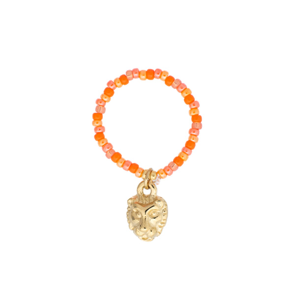 GLASS BEAD RING 2 MM ORANGE W/LION CHARM