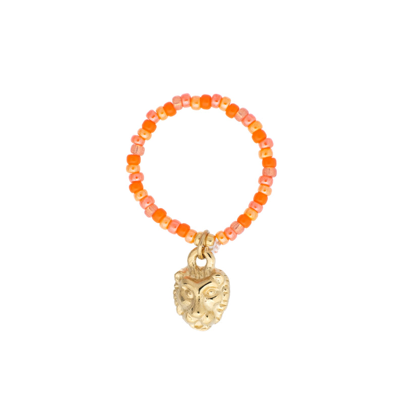 GLASS BEAD RING 2 MM ORANGE W/LION CHARM